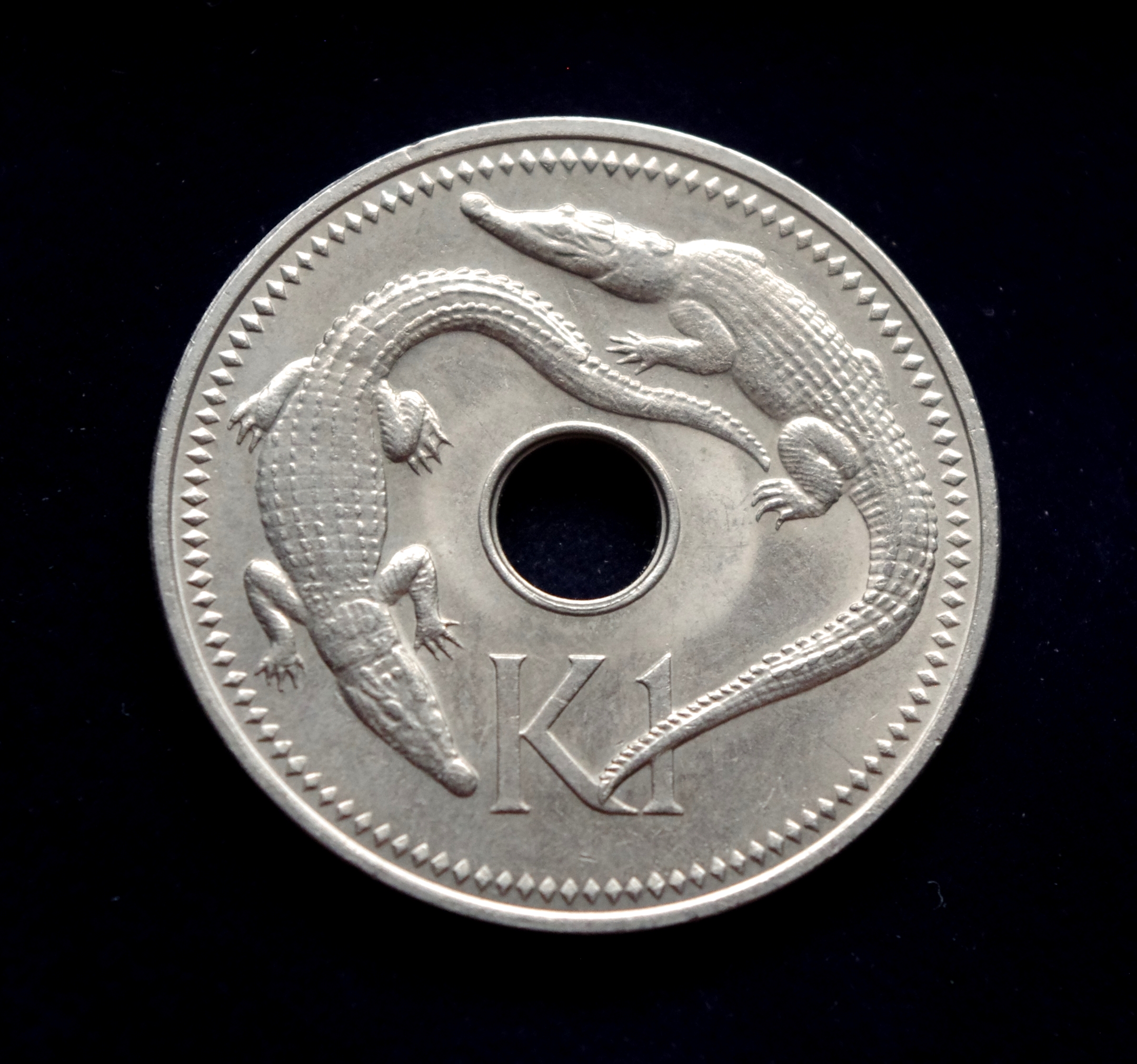 Papua Naujosios Gvinėjos 1 kinos moneta. Krokodilai