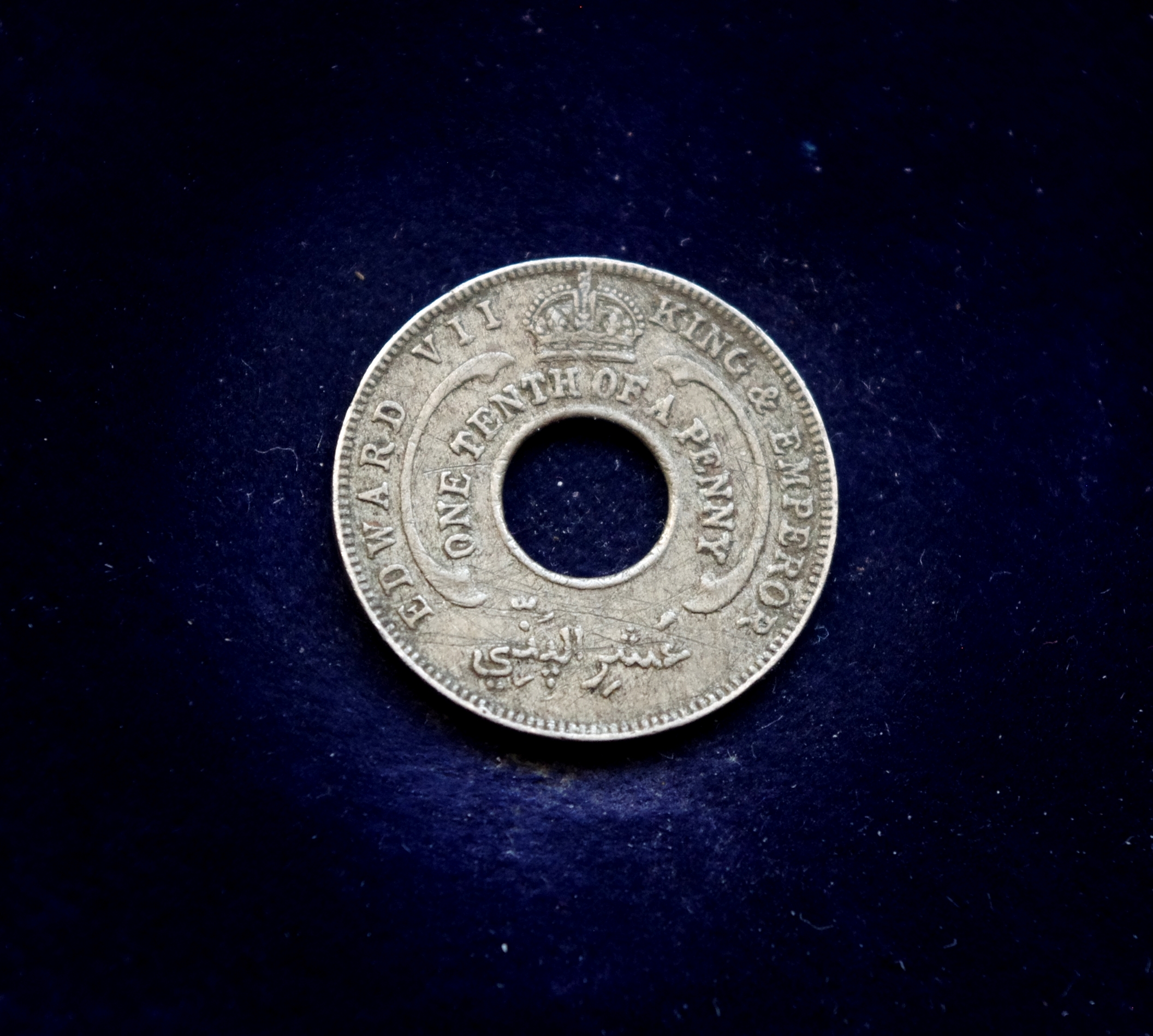 Britų Vakarų Afrikos 1/10 penso moneta