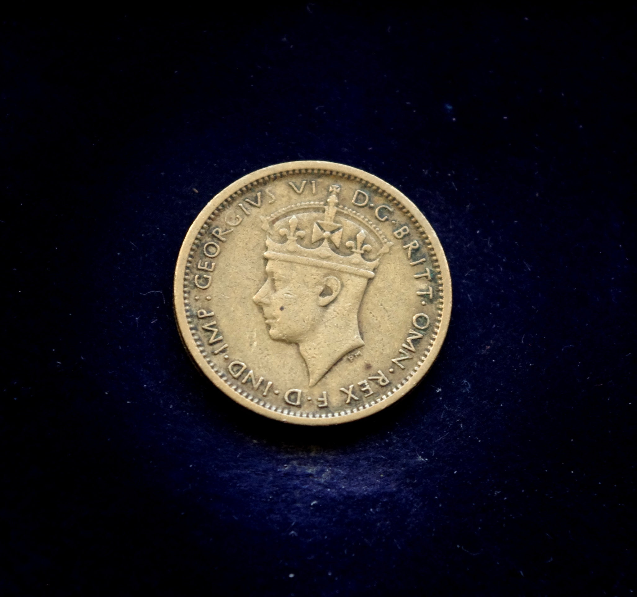 Britų Vakarų Afrikos 6 pensų moneta